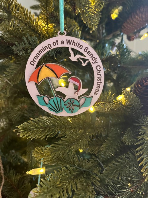 A sandy white Christmas ornament